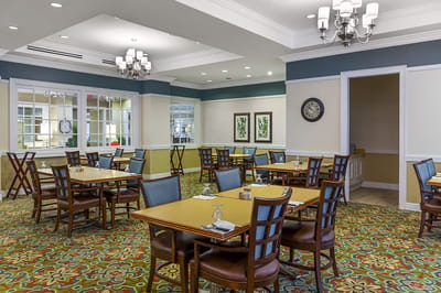 Dining area with neatly arranged tables and decor