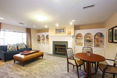 Cozy common area with seating and a fireplace