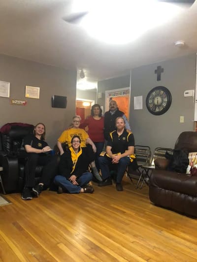 Staff and residents enjoying time together in a cozy common area