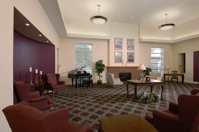 Interior common area with seating and piano