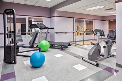 Interior view of a fitness room with exercise equipment