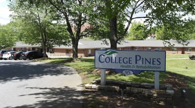Signage at College Pines Health and Rehabilitation Center near the entrance