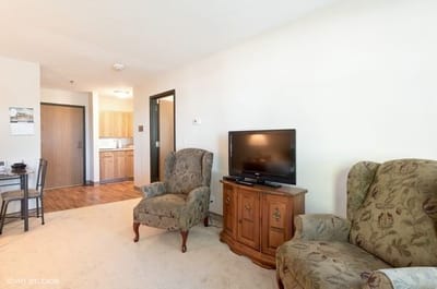 Cozy interior living space with seating area and TV