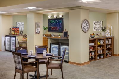 A cozy common area with dining setup and snacks
