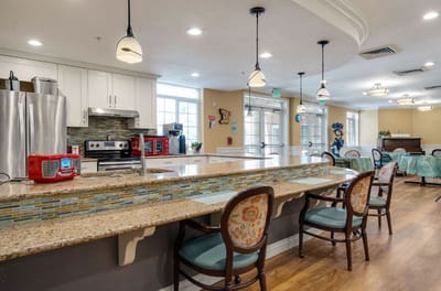 Interior view of a community kitchen with seating