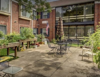 Outdoor patio area with seating and plants