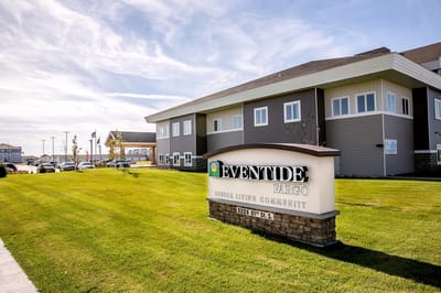 Exterior view of Eventide Fargo with landscaped front