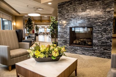 Interior common area with fireplace and seating