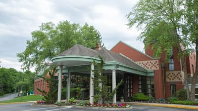 Exterior view of Evergreen Woods facility entrance.