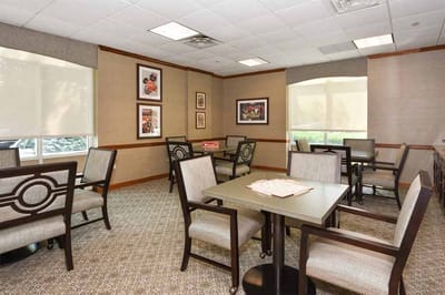Bright common area with seating and artwork
