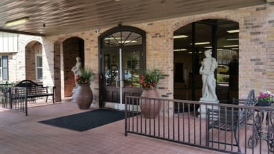 Entrance of Flannery Oaks Guest House with flower pots