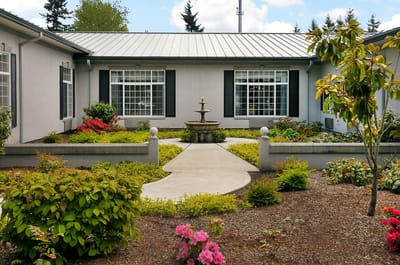 Beautiful garden space with fountain and landscaping