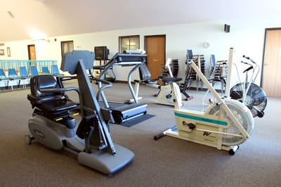 Fitness equipment in a facility exercise room