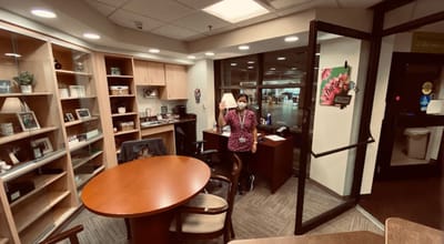 Staff member in a well-lit office space