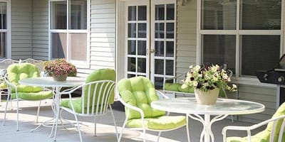 Outdoor space with seating and flower pots
