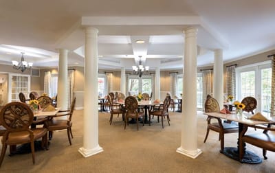 Bright dining room with tables and chairs