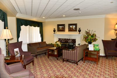 Cozy common area with seating and fireplace