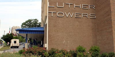 Exterior view of Lutheran Towers building with signage