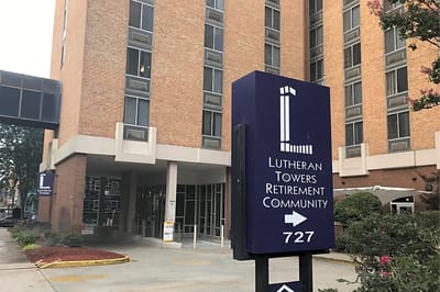 Exterior view of Lutheran Towers building and signage