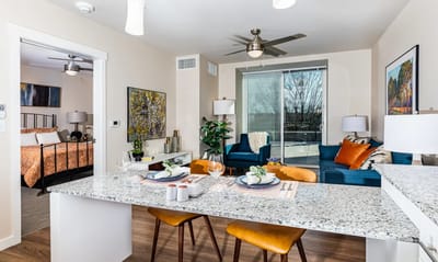 Bright interior of a spacious living area with kitchenette