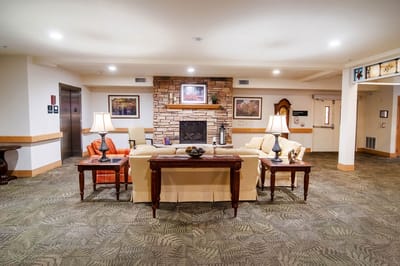 Cozy common area with seating and a fireplace