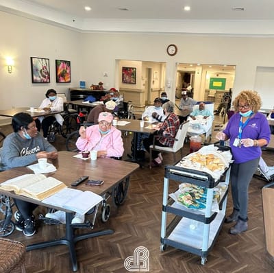 Residents enjoying a meal in the dining area