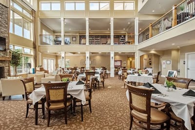 Brightly lit dining area with elegant table settings