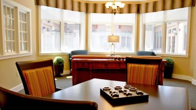 Bright common area with seating and natural light