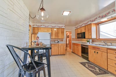 Bright kitchen area with modern appliances