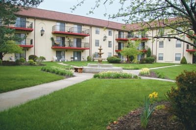 Beautiful courtyard with a fountain and greenery