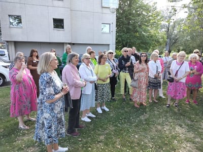Residents and staff gathered outdoors for an event