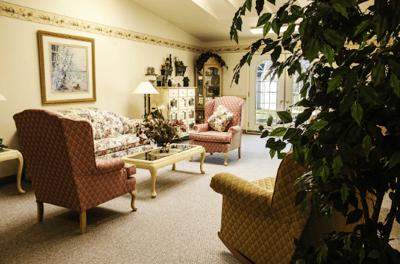 Common area with floral furniture and decor