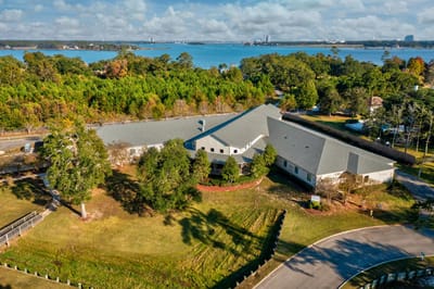 Aerial view of the SummerHouse Bay Cove facility near a lake