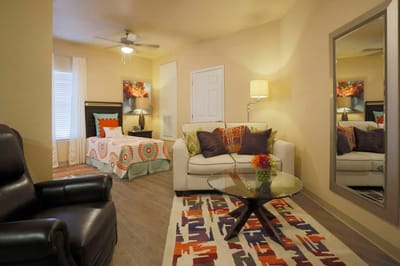 Interior view of a cozy resident room with furnishings