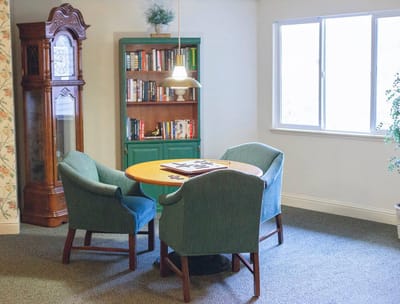 Cozy reading area with a table and chairs
