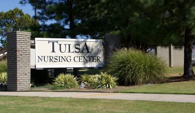 Sign for Tulsa Nursing Center at the entrance