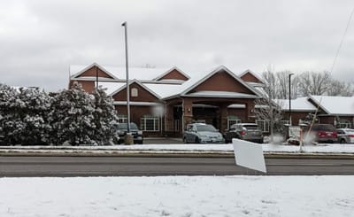 Exterior view of assisted living facility in winter