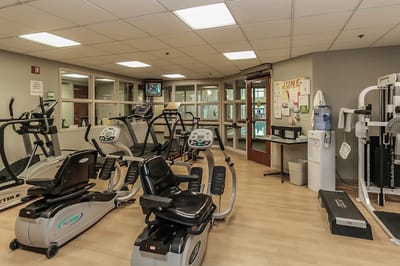 Interior view of a fitness room with exercise equipment