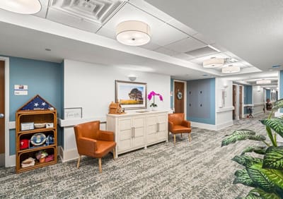 Bright interior common area with seating and decor