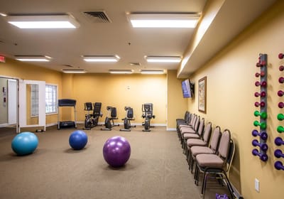 Interior view of a fitness area with exercise equipment