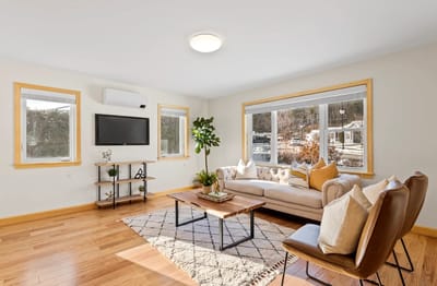 Bright common area with comfortable seating and natural light