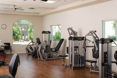Interior view of a fitness area with exercise machines
