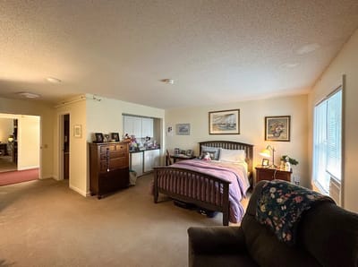 Cozy bedroom with personal decorations and natural light