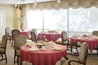 Dining area with tables set for a meal