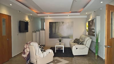 Bright interior common area with seating and decor