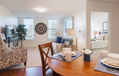 Bright interior common area with seating and decor
