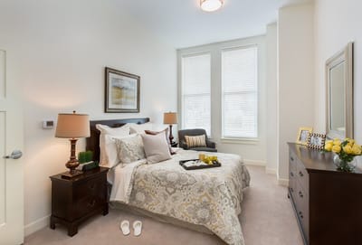 A cozy bedroom with elegant decor and natural light