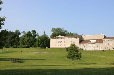 Exterior view of Trailside Gardens facility from outdoor space