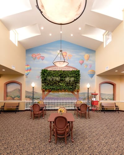 Bright lobby with mural and seating area