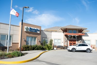 Exterior view of MorningStar Assisted Living with facility sign